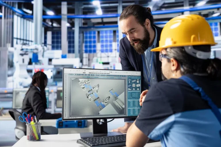 imgi_7_photovoltaics-factory-supervisor-checking-work-done-by-employee_482257-117968